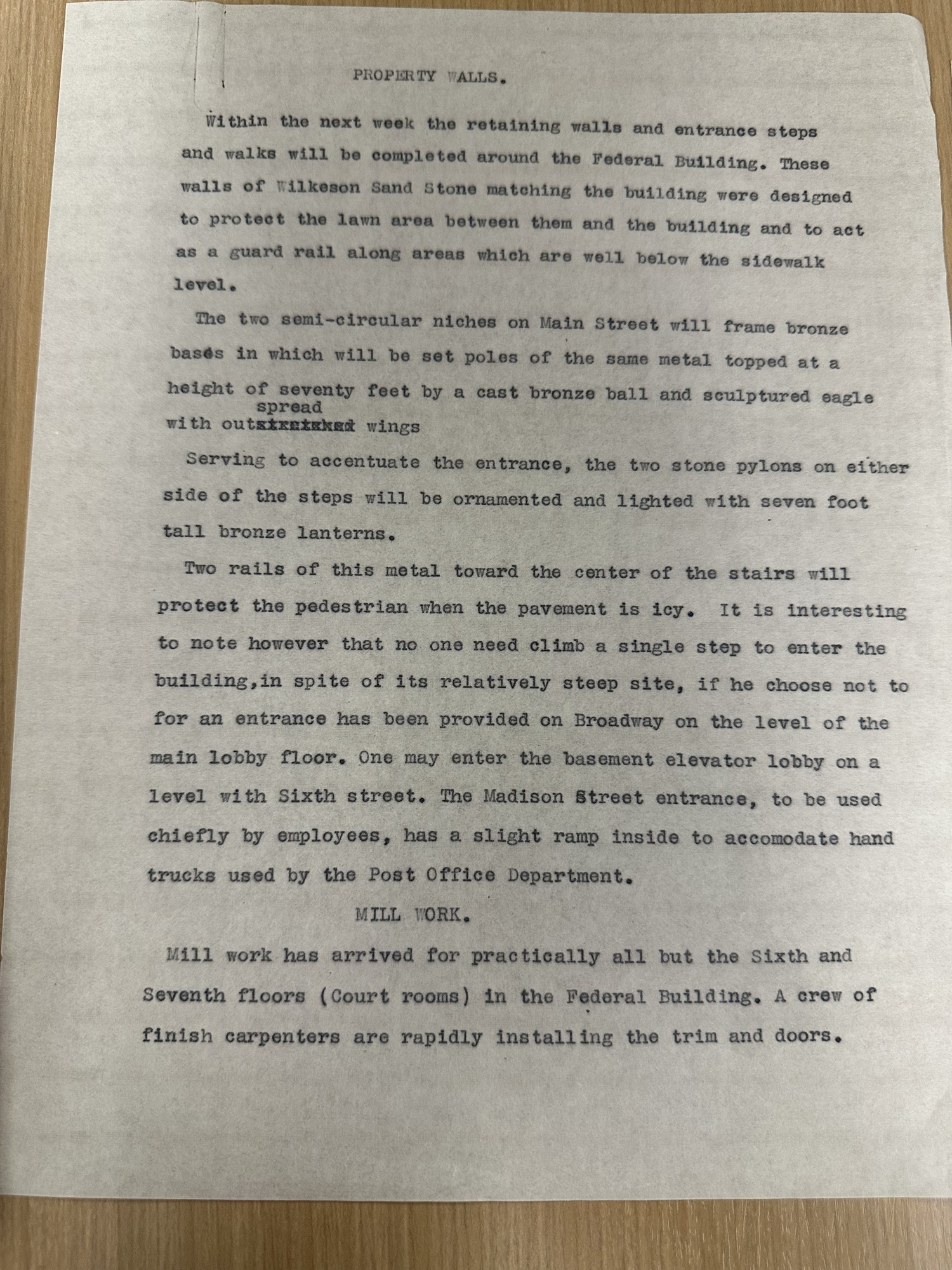 Report: courthouse property walls, bronze eagle entrance, and mill work
