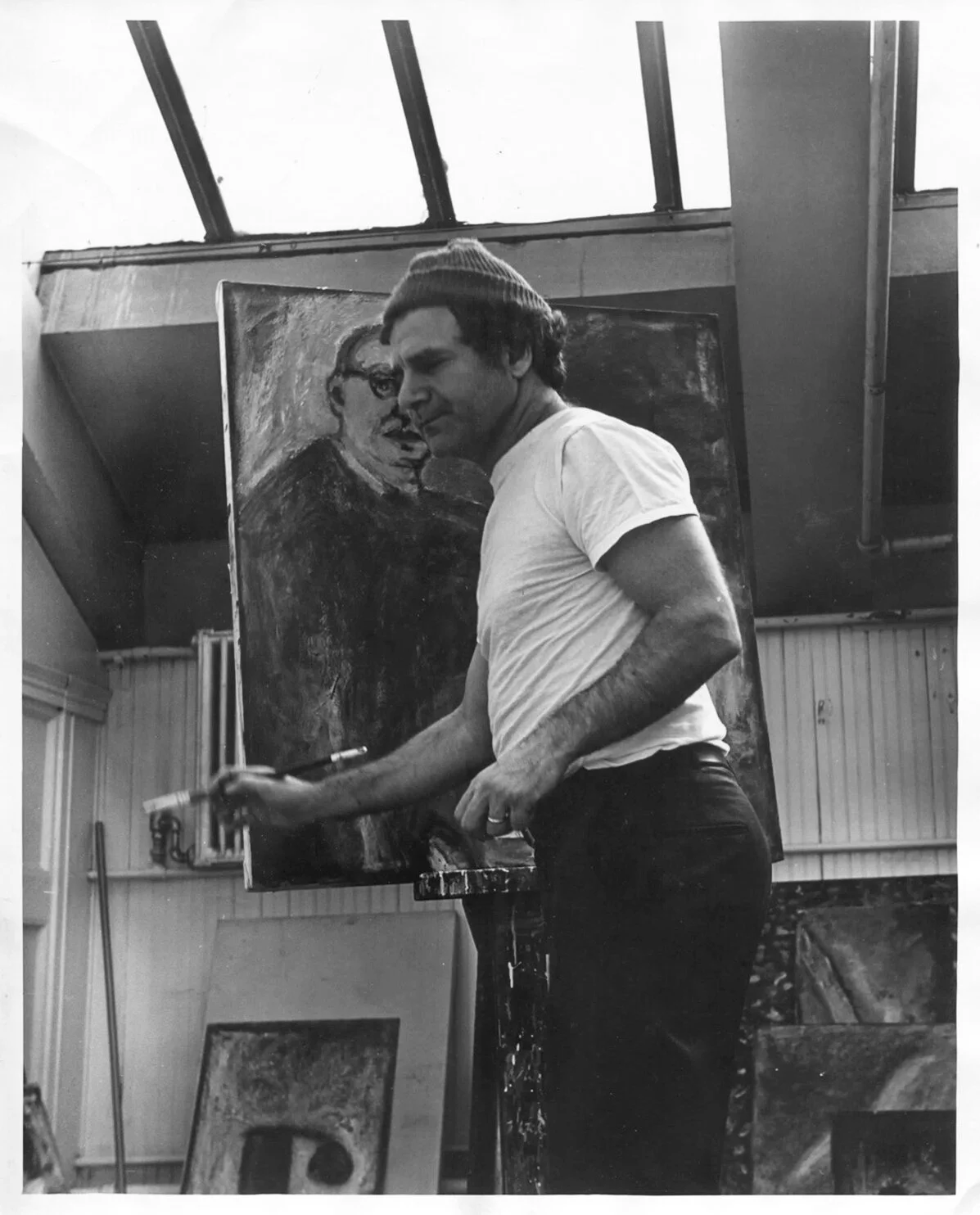 Gandy Brodie with his portrait of Judge Solomon